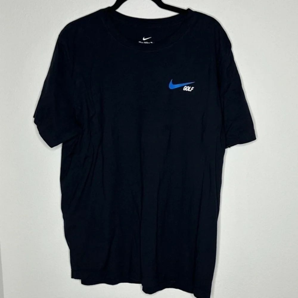 Nike Men's Black Tee with Blue Logo